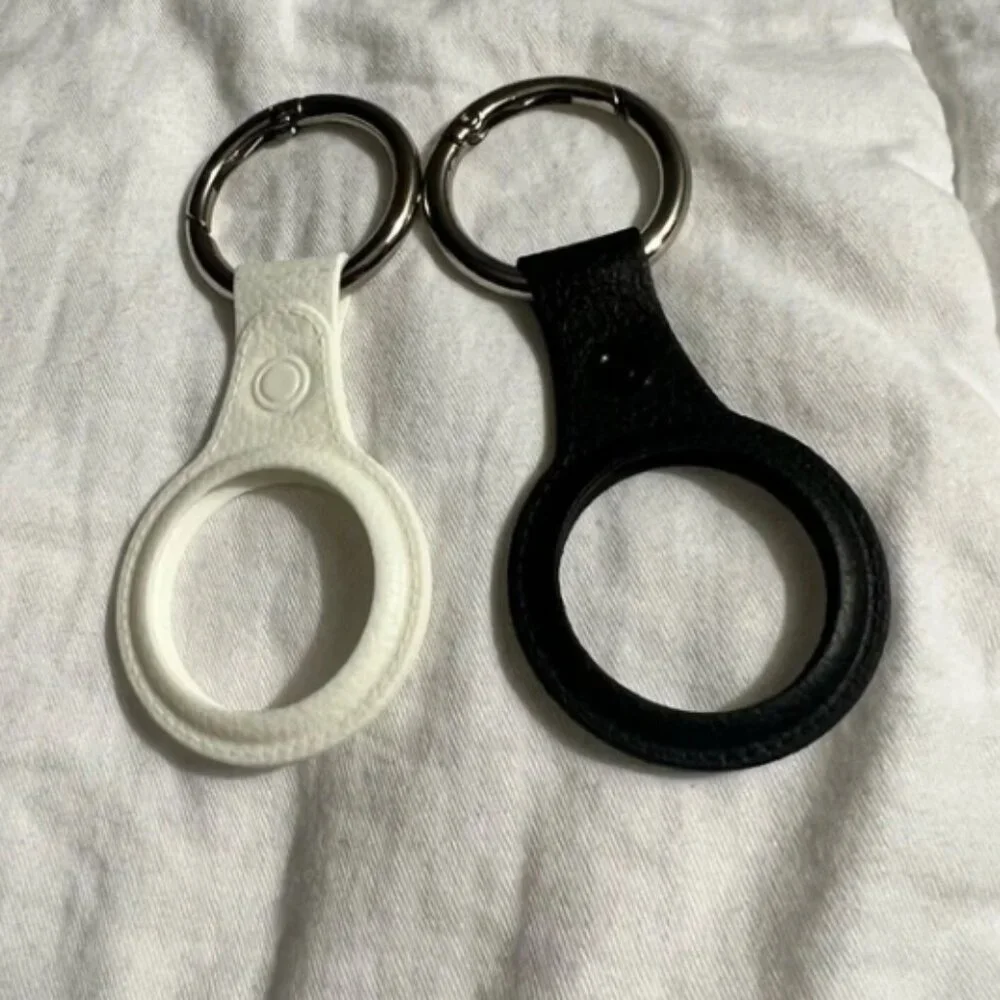 Air tag holders, 2 pack, new, black and white, Moko Brand